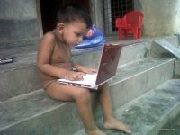 funny-kid-without-clothes-playing-with-laptop.jpg