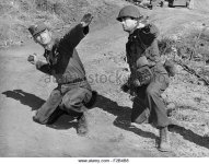 actor-gregory-peck-right-gets-a-lesson-in-hand-grenade-throwing-from-f2b4b8.jpg