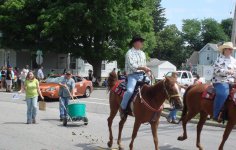 2009-Bicycle-Days-Parade-Horses-and-Cleanup-Crew-780223-e1381072071195.jpg