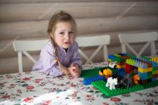 depositphotos_104787662-stock-photo-sad-little-caucasian-girl-playing.jpg