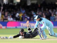 England-s-Jos-Buttler-runs-out-New-Zealand-s-Martin-Guptill_16bf62c7921_large.jpg