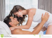 romantic-couple-bed-home-side-view-young-43658029.jpg