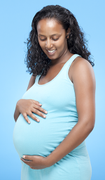 Pregnant-woman-with-hands-on-stomach-and-smiling.png