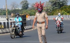 9ofscrkg_corona-helmet-afp_625x300_28_March_20.jpg