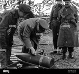 Churchill signing shells for Hitler.jpg
