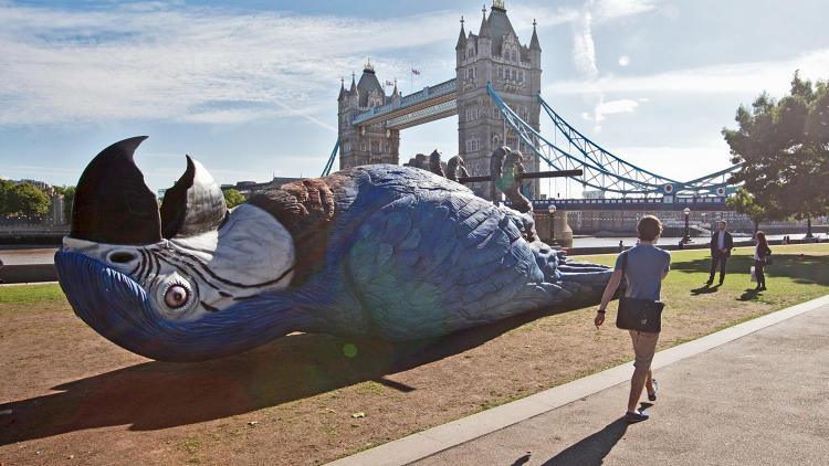 3033103-slide-s-4-london-celebrates-the-monty-python-reunion-by-putting-a-50-foot-dead-parrot-in-potters-field.jpg