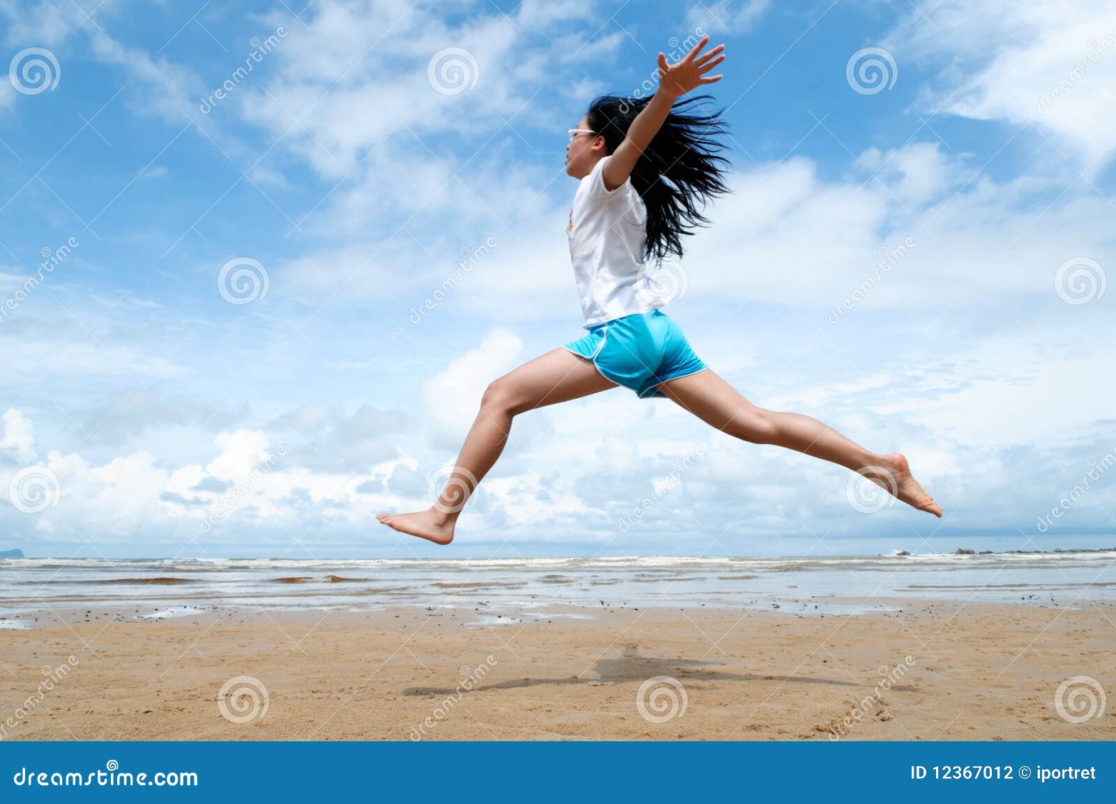 excited-young-girl-leaping-air-12367012.jpg