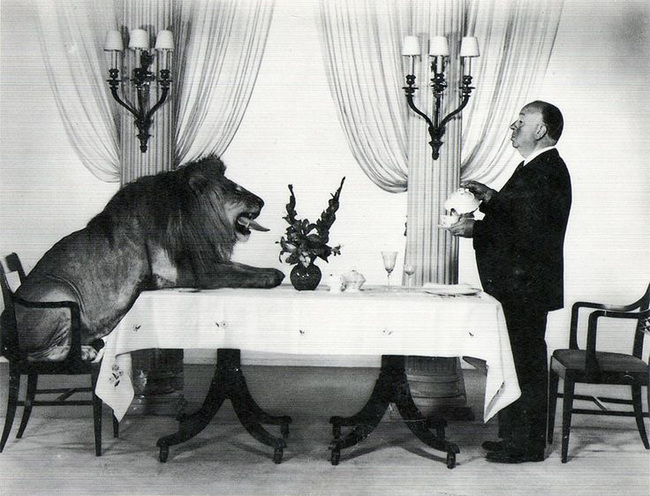 hitchcok-and-the-mgm-lion-1957.jpg