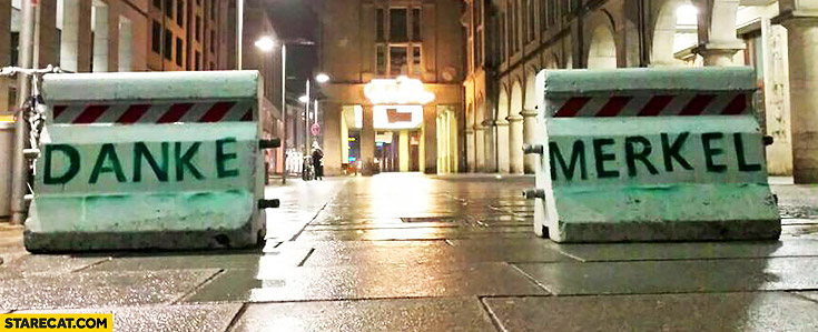 danke-merkel-written-on-a-road-blockade.jpg